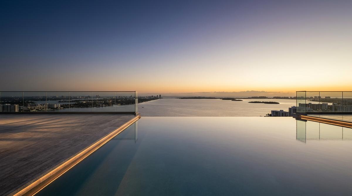 Infinity pool overlooking the bay at sunset