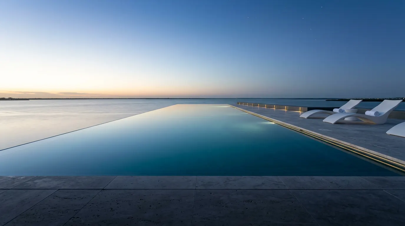 Infinity pool overlooking the bay at sunset